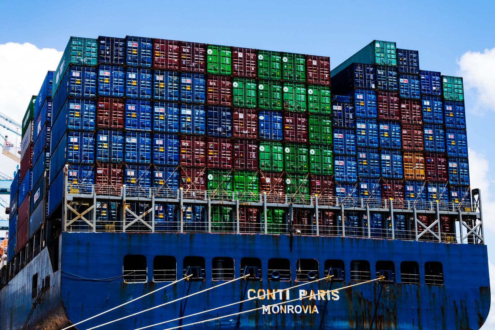 Container ship loaded with export cargo at port