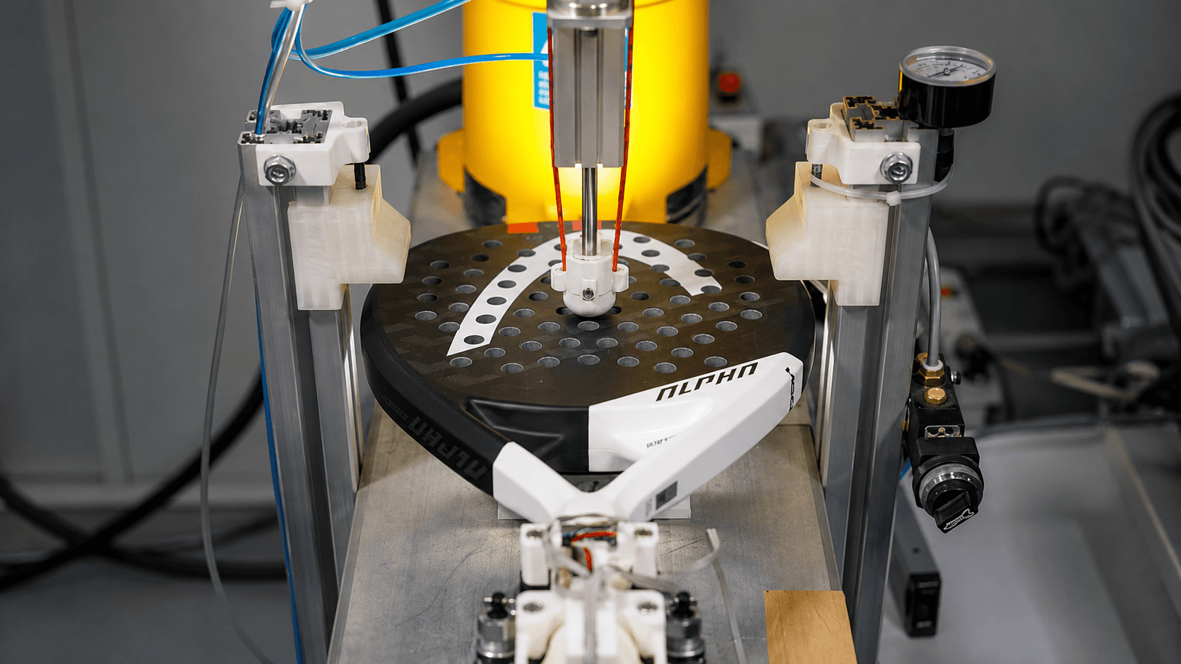Vernier caliper measuring a component during quality inspection
